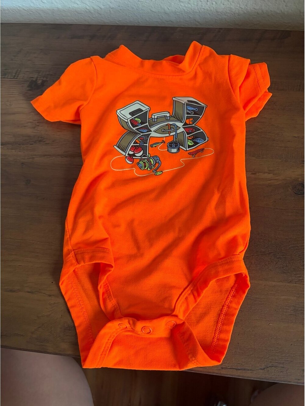 Under Armour orange onesie size 0/3M